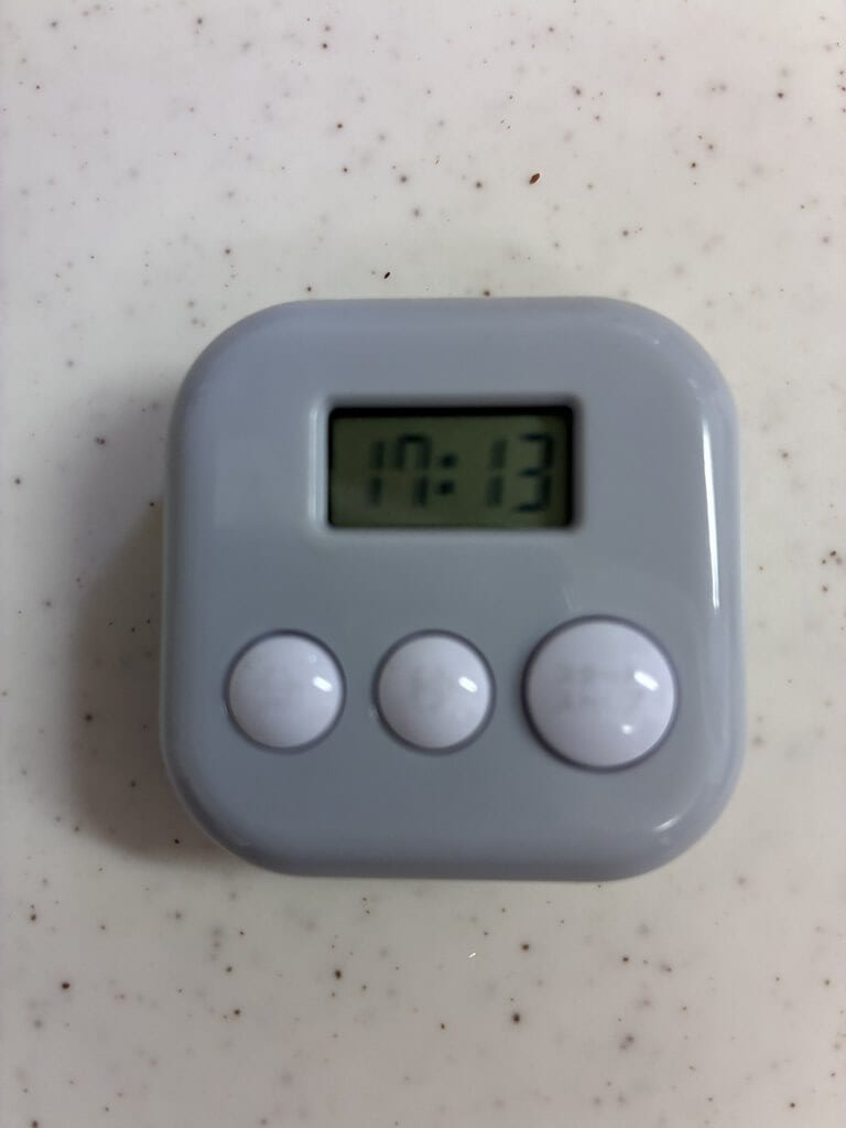 調理にかかった時間を示すキッチンタイマーを撮影した写真